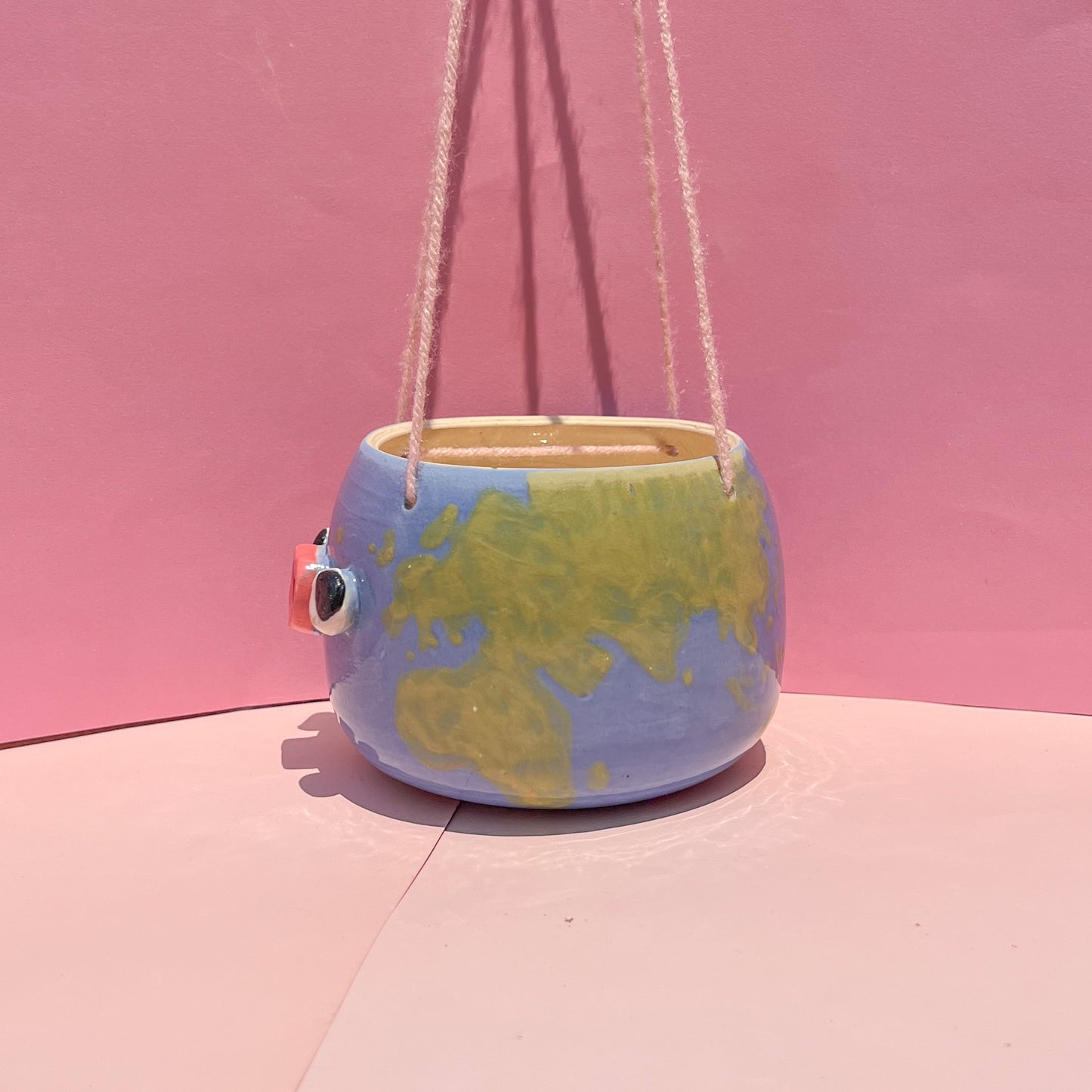 Earth hanging planter