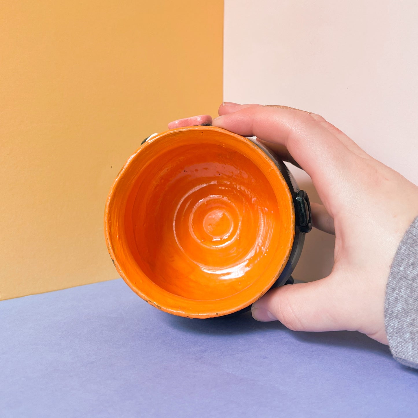 Orange cauldron planter