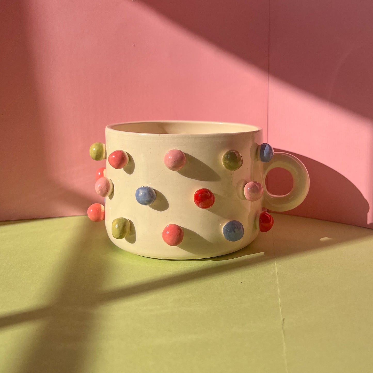 Colorful poka dot mug