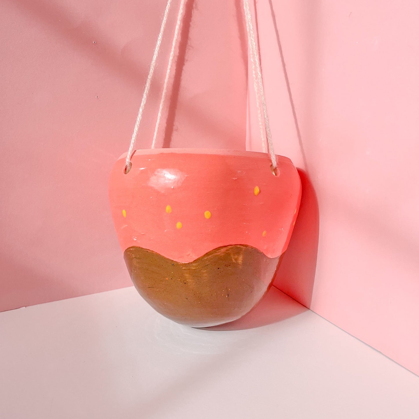 Pink strawberry hanging planter