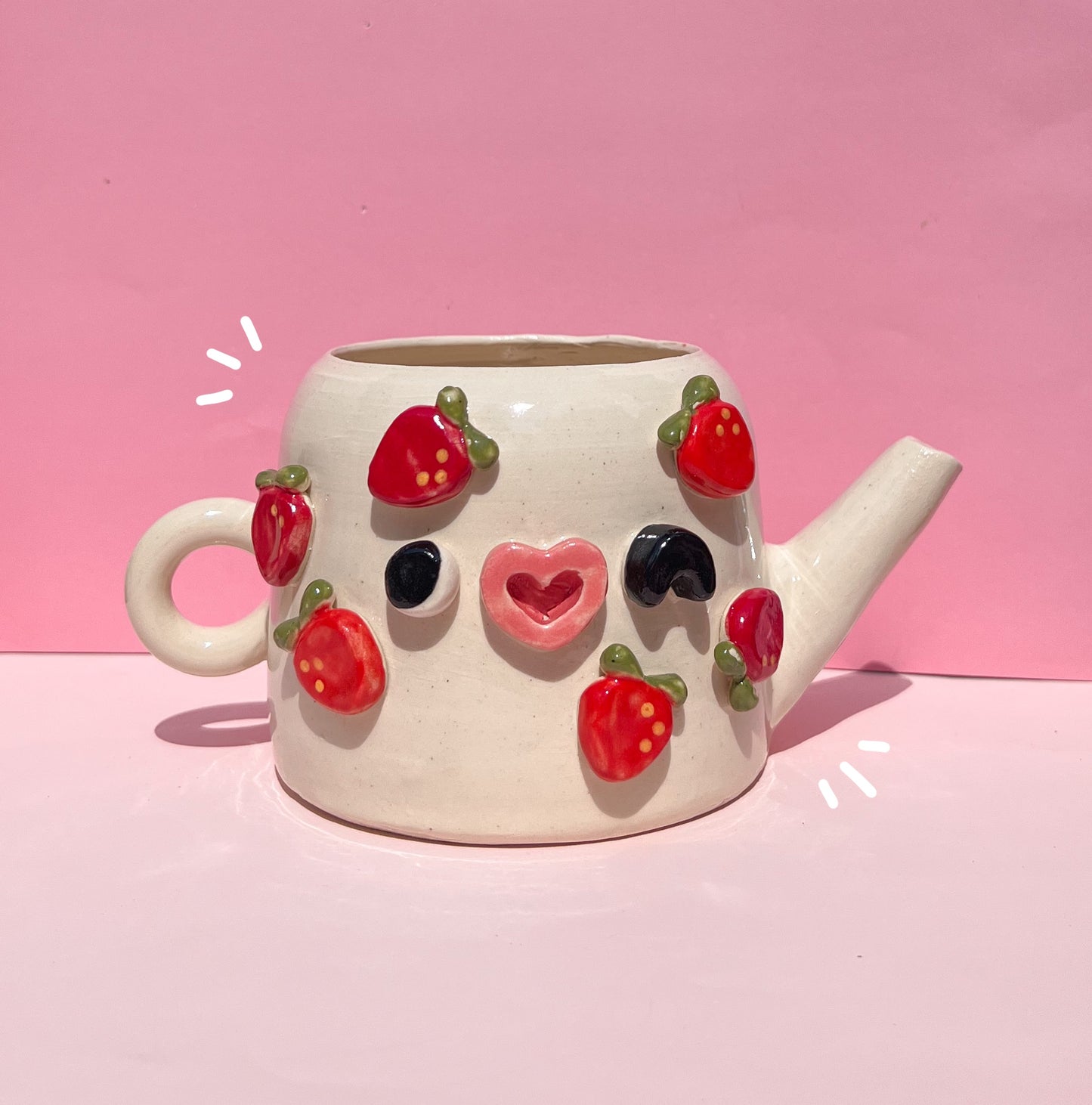 Strawberry watering can