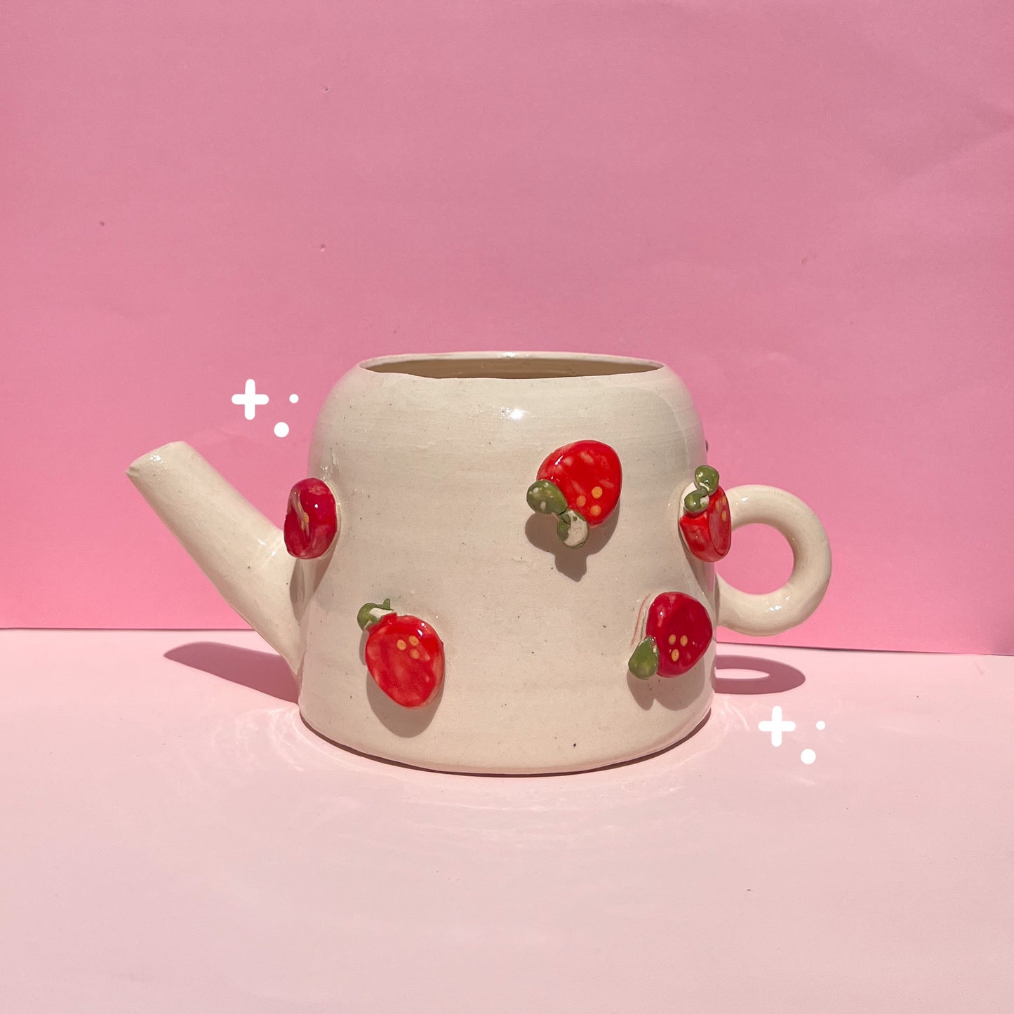 Strawberry watering can