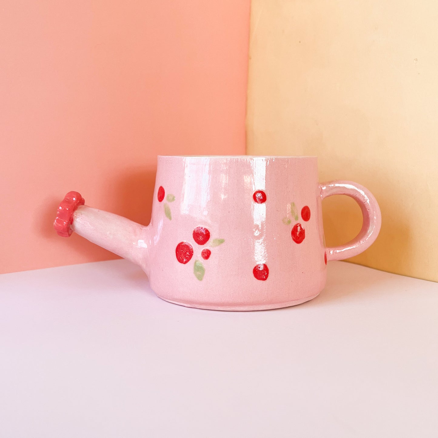 Rosy watering can