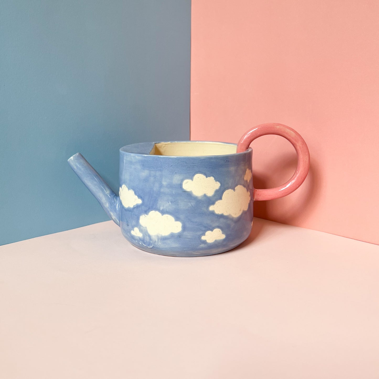 Cloudy watering can